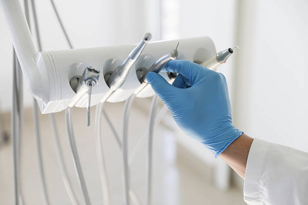 Professional Tooth Extraction technician working in Pikesville, MD